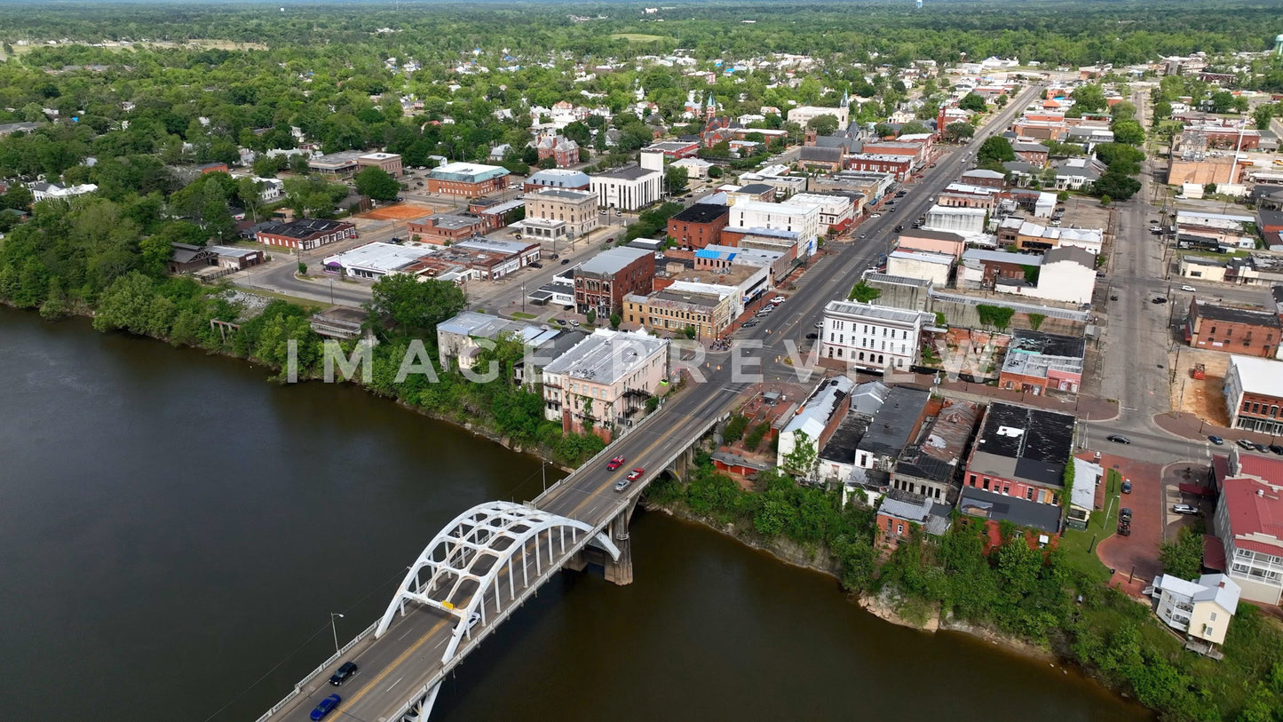 stock photo Selma, AL city skyline beside Alabama River