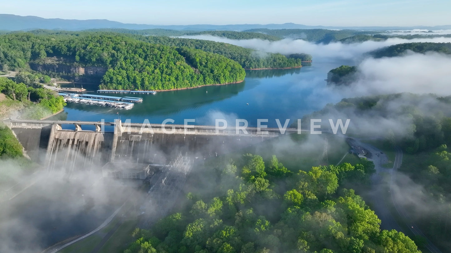 stock photo morning fog over Norris Dam in tennessee mountains