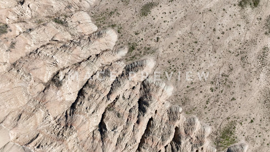 4k Still Frame - Badlands, South Dakota bottom of Butte eroding into mixed-grass prairie