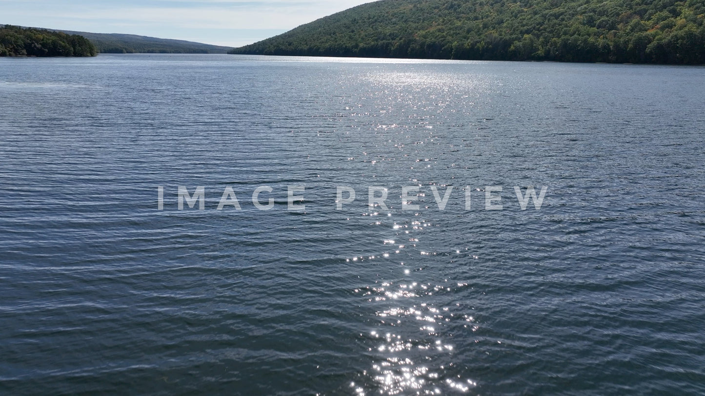 4k Still Frame - Canadice Lake, NY beautiful sunlight reflecting on water