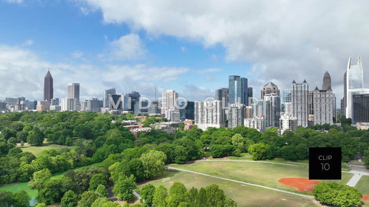CLIP 10 - Atlanta, GA aerial Piedmont Park in foreground with city skyline office towers