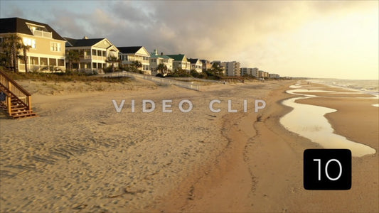 CLIP 10 - Litchfield Beach, SC beach front homes cast in golden morning light