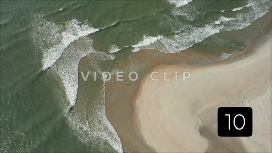 CLIP 10 - Pawleys Island, SC people walking by breaking waves on North inlet sand bar