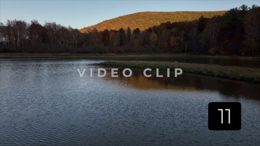 CLIP 11 - Tioga Dam and Reservoir, PA rising up over wetland to reveal mountain
