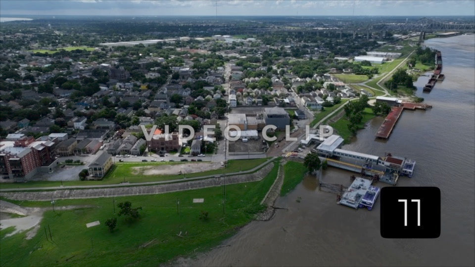 CLIP 11 - New Orleans, LA Vol. 3 - Flood wall protecting homes from storm surge on Mississippi River