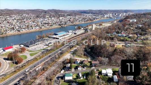 CLIP 11 - Charleston, WV aerial flying over neighborhood to downtown