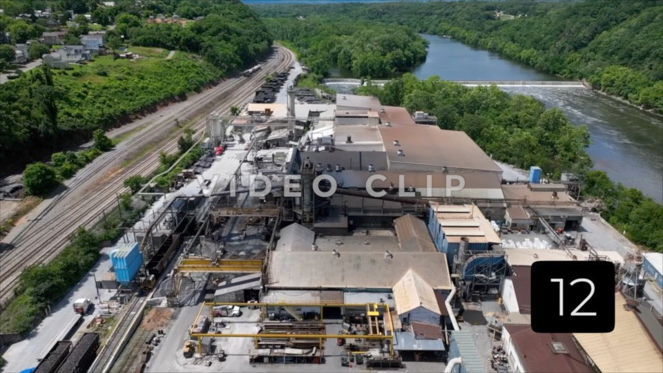 CLIP 12 - Lynchburg, VA Vol. 2 - drone flight over industrial mill by James River