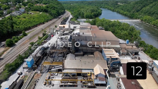 CLIP 12 - Lynchburg, VA Vol. 2 - drone flight over industrial mill by James River