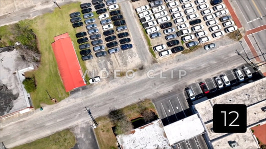 CLIP 12 - Hemingway, SC drone spinning over city street then rotating down to see more downtown