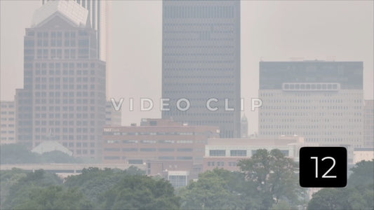 CLIP 12 - Rochester, NY Vol. 8 - Dense wildfire smoke for Canadian forest fires blankets office towers in downtown