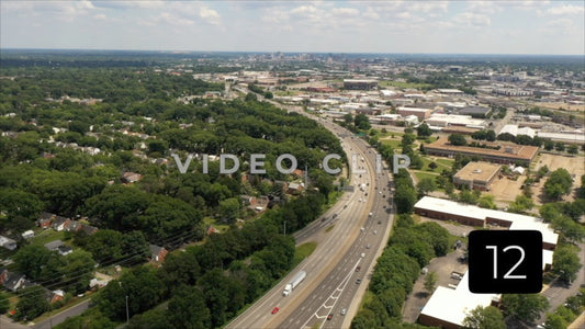 CLIP 12 - Richmond, VA Vol. 1 - travelers driving on interstate 95 past urban neighborhood