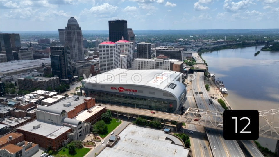 CLIP 12 - Louisville, KY side view of KFC Yum! Center then flying towards Ohio River