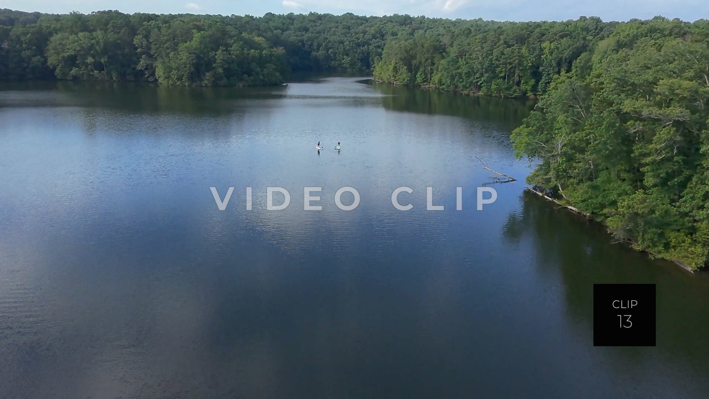 CLIP 13 - Stone Mountain Park, GA Lake with paddleboaders enjoying sunny day on the water