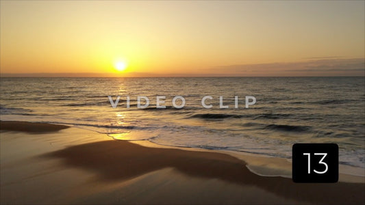 CLIP 13 - Litchfield Beach, SC beautiful golden sunrise over the ocean with breaking waves