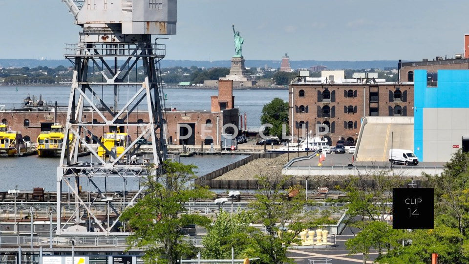 CLIP 14 - New York, NY Statue of Liberty seen past cargo shipping crane on Staten Island