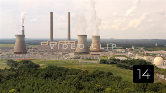 CLIP 14 - Plant Bowen, GA rising above trees to view coal-fired power plant operations