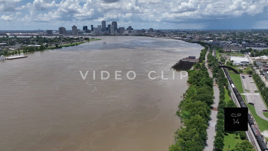 CLIP 14 - New Orleans, LA distant view of city skyline beside Mississippi River