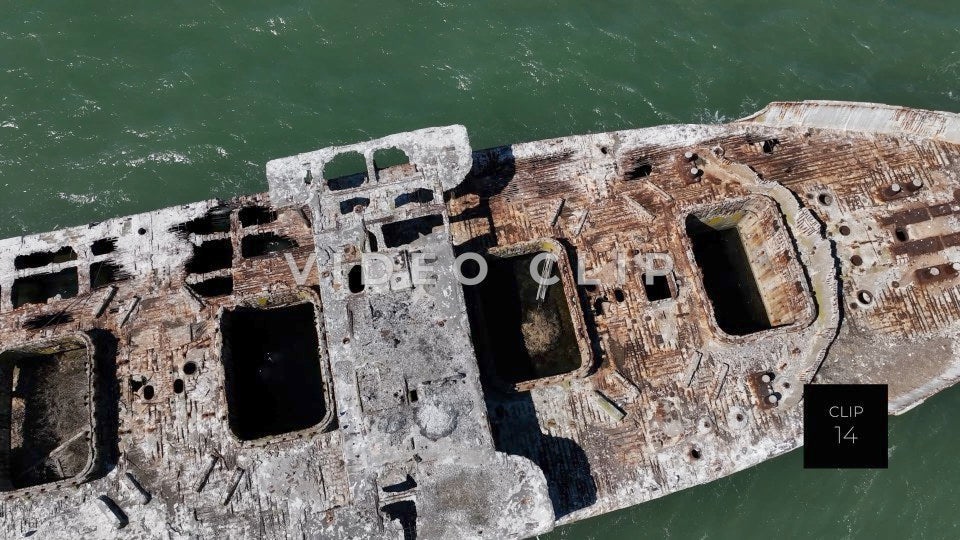 CLIP 14 - Kiptopeke Concrete Ships, VA looking down on ship as pelican flies by