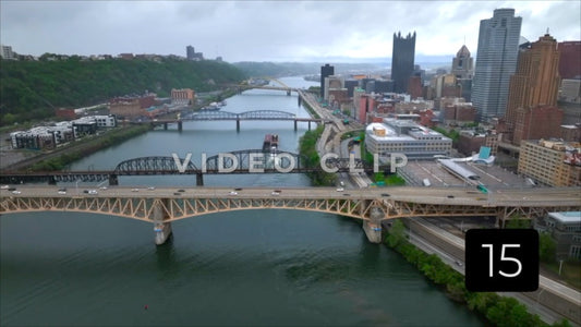 CLIP 15 - Pittsburgh, PA Vol. 2 - barge traveling down river as camera pulls away