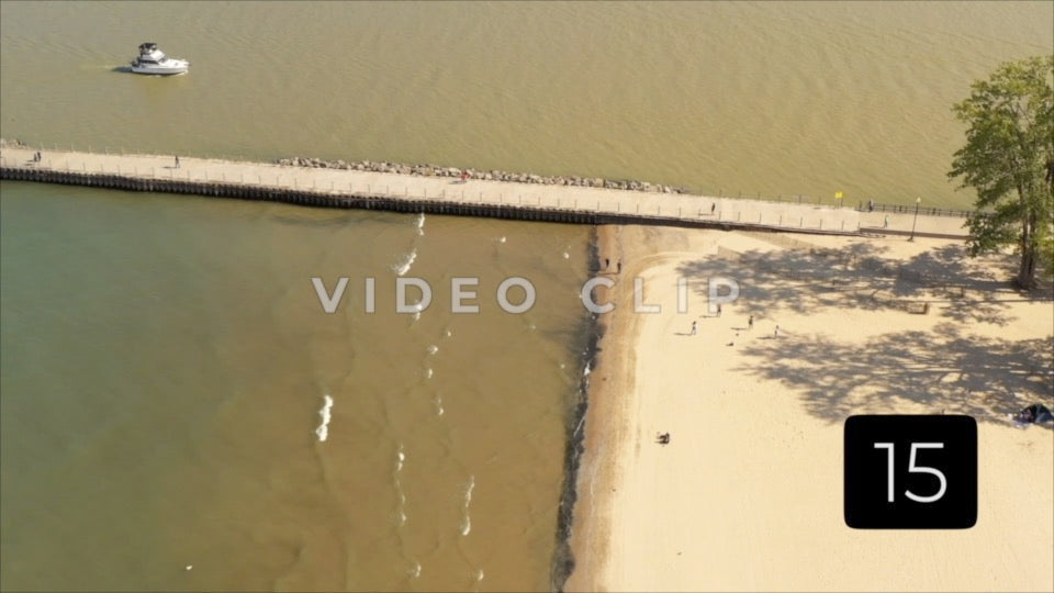 CLIP 15 - Rochester, NY Vol. 5 - People walking shoreline at Ontario Beach Park
