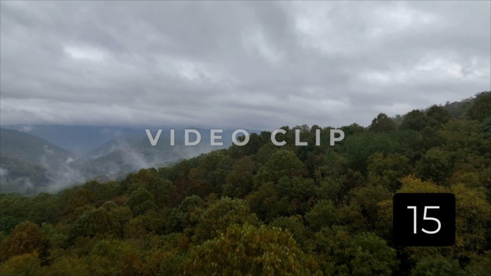 CLIP 15 - Ohiopyle, PA mist and fog form over mountain as clouds pass overhead