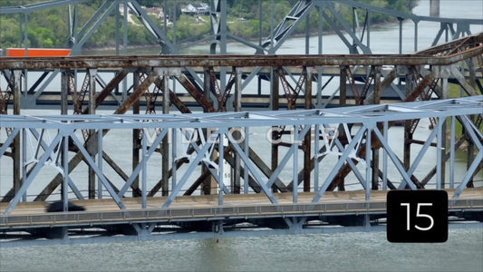 CLIP 15 - Cincinnati, Ohio zoom view of Iron truss bridges with traffic