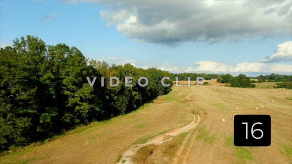 CLIP 16 - Eatonton, GA - country road on farmer's field
