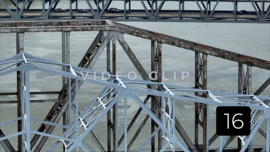 CLIP 16 - Cincinnati, Oho zoom view of iron truss bridges with traffic driving over Ohio river