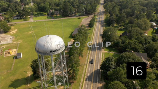 CLIP 16 - Hawkinsville, GA watertower beside rural highway