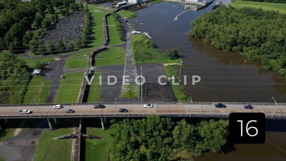 CLIP 16 - New Orleans, LA Vol. 3 - Aerial following Flood wall beside bayou
