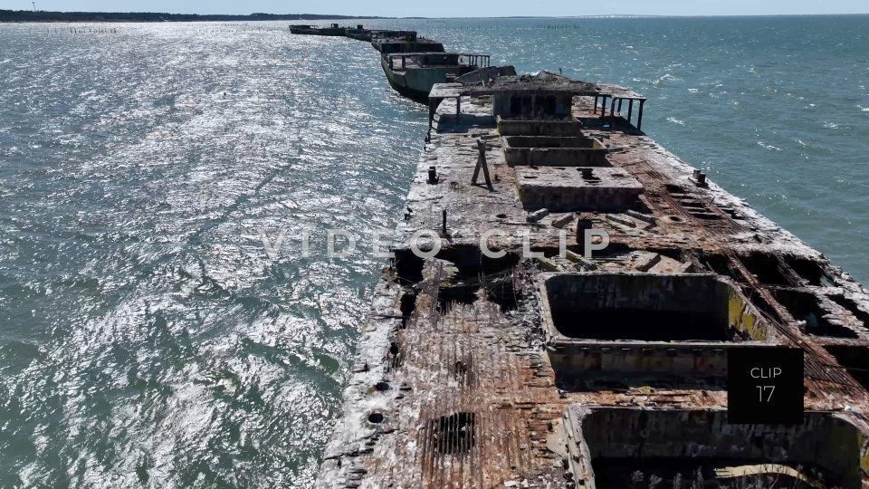 CLIP 17 - Kiptopeke Concrete Ships, VA gentle rise above ship formation as breakwater