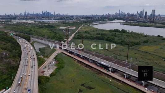 CLIP 17 - New York, NY Interstate 95 traffic crossing Hoboken River with NY skyline in distance