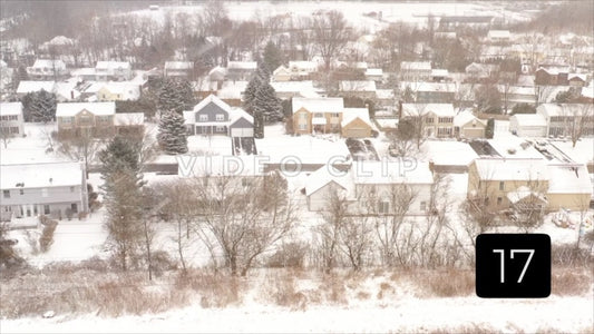 CLIP 17 - Winter Vol. 2 - Small town neighborhood covered in snow during Winter freeze