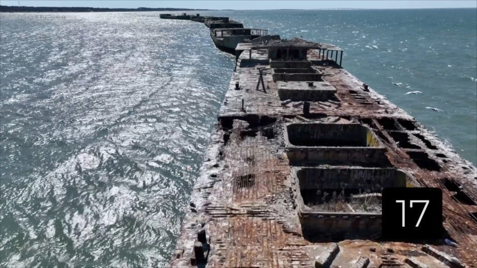 CLIP 17 - Kiptopeke Concrete Ships, VA gentle rise above ship formation as breakwater