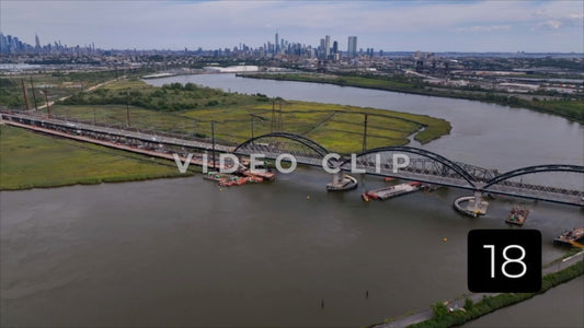 CLIP 18 - New York, NY Vol 2. - Interstate 95 traffic crossing Hoboken River in New Jersey with NY skyline on horizon