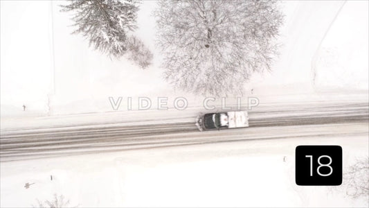 CLIP 18 - Winter Vol. 4 - Truck with snow plow drives through neighborhood in Winter with snow