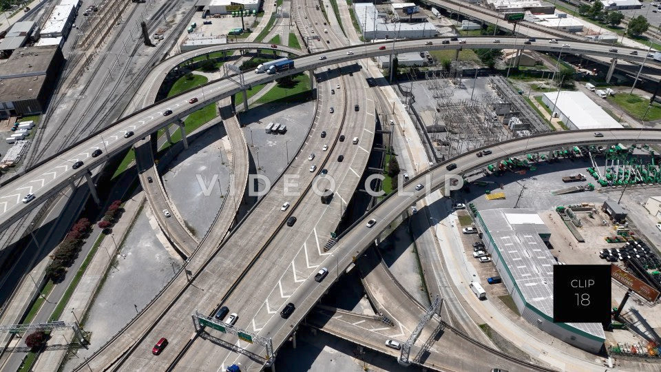 CLIP 18 - New Orleans, LA looking down on cars and trucks traveling on highway interchanges