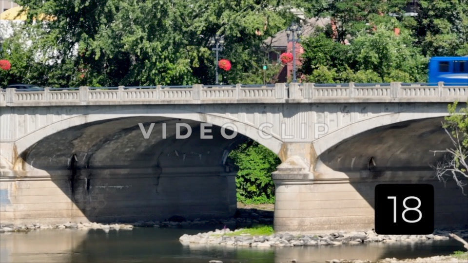 CLIP 18 - Binghamton, NY traffic crossing arched bridge over Chenango River downtown