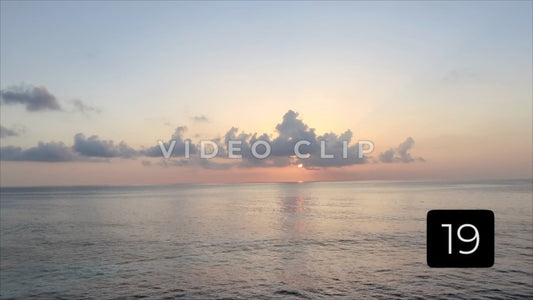 CLIP 19 - Isla Mujeras, Mexico beautiful sunrise with clouds over peaceful Caribbean water