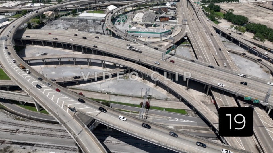 CLIP 19 - New Orleans, LA Vol. 1 - looking down on cars and trucks traveling on highway interchanges