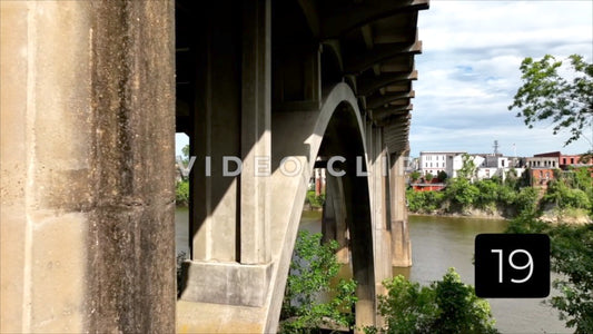 CLIP 19 - Selma, AL view of Edmund Pettus Bridge from below street level with view of sunlight on arches