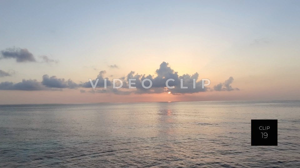 CLIP 19 - Isla Mujeras, Mexico beautiful sunrise with clouds over peaceful Caribbean water