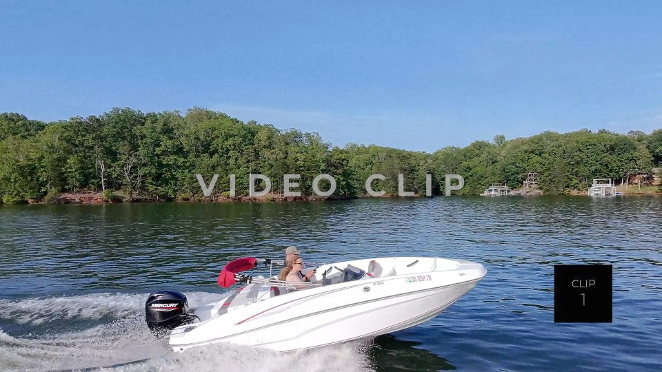 CLIP 1 - Lake Lanier, GA Couple in boat motors by camera