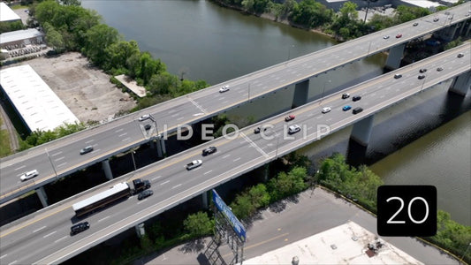CLIP 20 - Nashville, TN traffic on highway crossing over industrial area and river