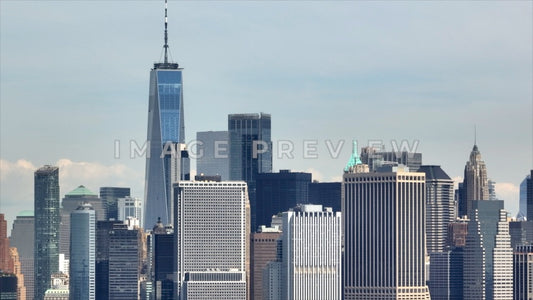 Photo - New York City, NY World Trade Center towering above office buildings in Manhattan