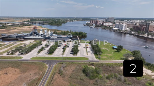 CLIP 2 - Wilmington, NC Battleship North Carolina beside Cape Fear River with city skyline