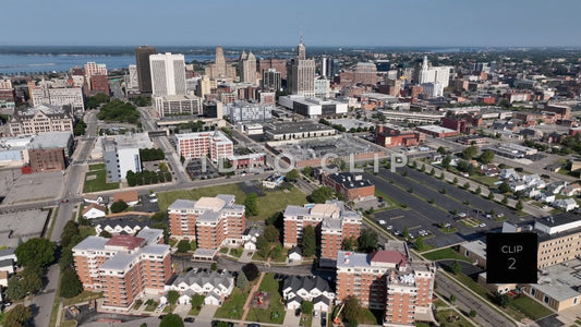 CLIP 2 - Buffalo, NY aerial flight over neighborhoods and office buildings toward downtown