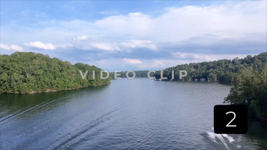 CLIP 2 - Lake Lanier, GA Aerial of boat then rising up to view Lake