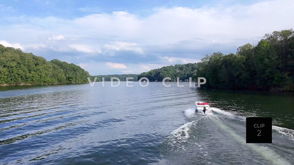 CLIP 2 - Lake Lanier, GA Aerial of boat then rising up to view Lake