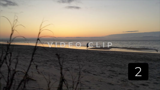 CLIP 2 - Litchfield Beach, SC person walking on beach at sunrise